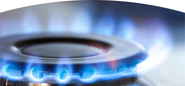 Estufa de gas encendida con llamas azules