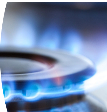 Estufa de gas encendida con llamas azules