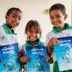 Children with "The Adventures of the Water Guardian" Booklet