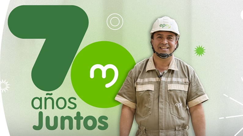 Empleado de EPM con casco y uniforme beige sonriendo