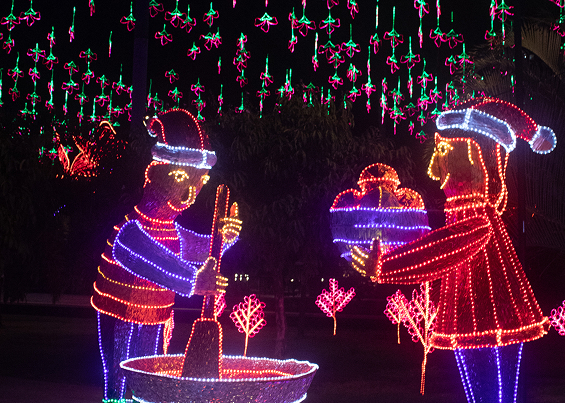 Alumbrado de dos personas realizando natilla