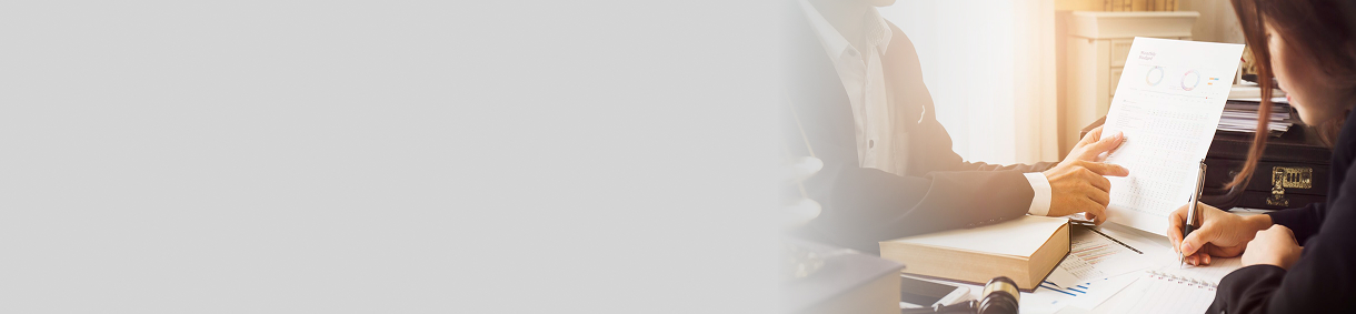 A person showing some papers to another person